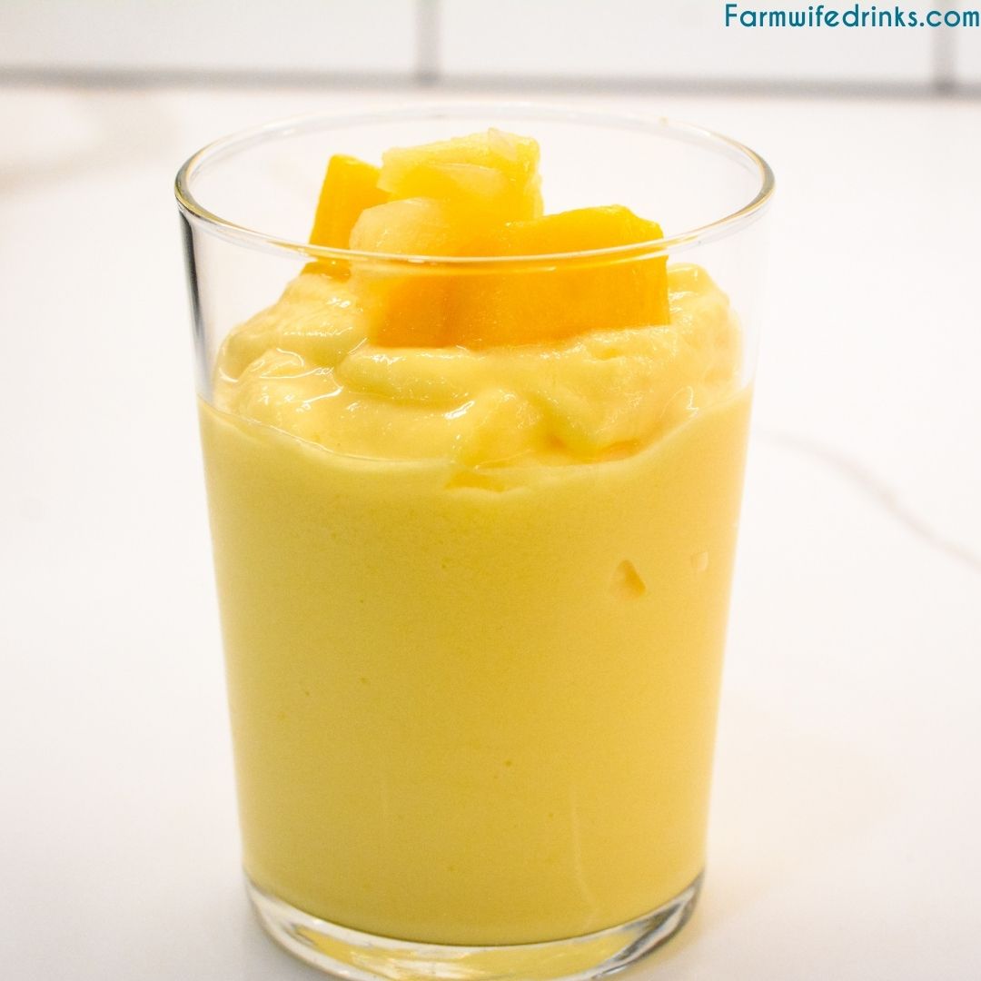 Mango Magic Smoothie is the current smoothie obsession by my swimmer that is made as a copycat to the Tropical Smoothie Cafe smoothie with just three simple ingredients of mango, pineapple, and greek yogurt.