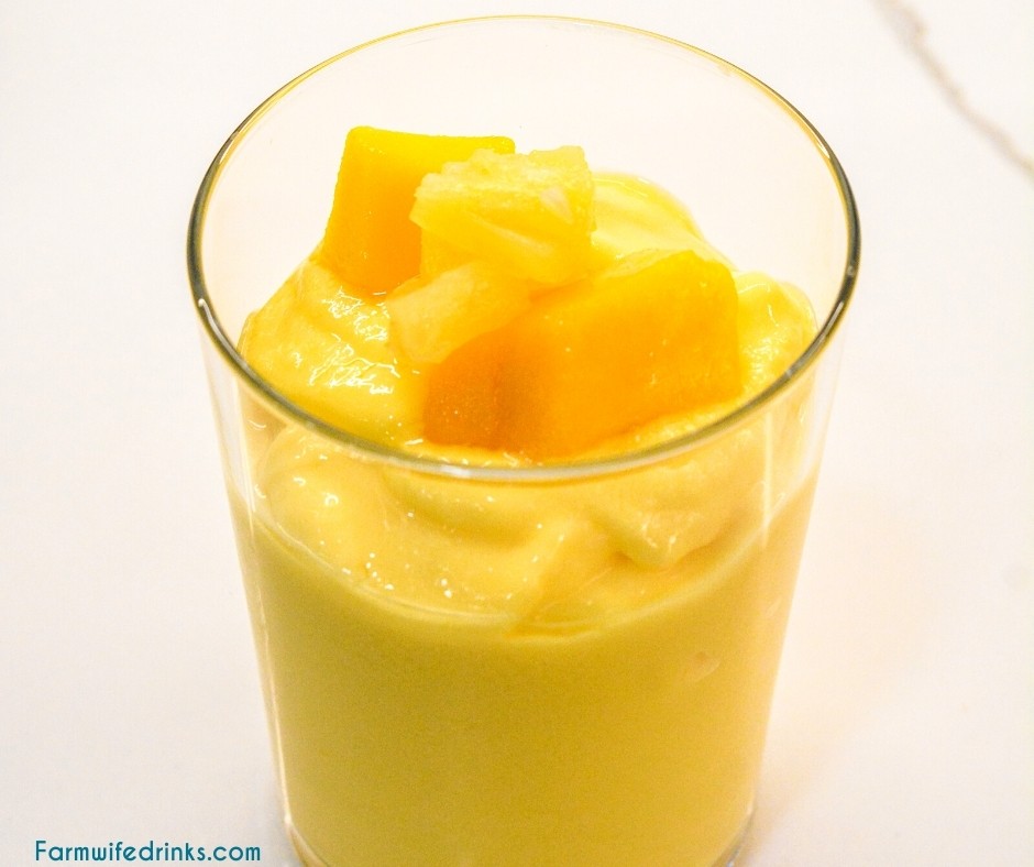 Mango Magic Smoothie is the current smoothie obsession by my swimmer that is made as a copycat to the Tropical Smoothie Cafe smoothie with just three simple ingredients of mango, pineapple, and greek yogurt.