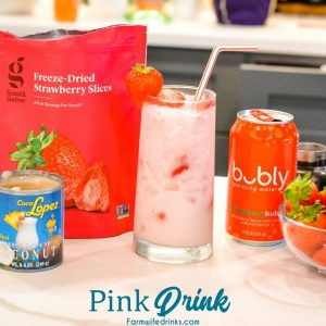Copycat Starbucks pink drink is a simple combination of cream of coconut, freeze-dried strawberries, fresh strawberries, and sparkling strawberry water makes this drink simple yet refreshing to make.