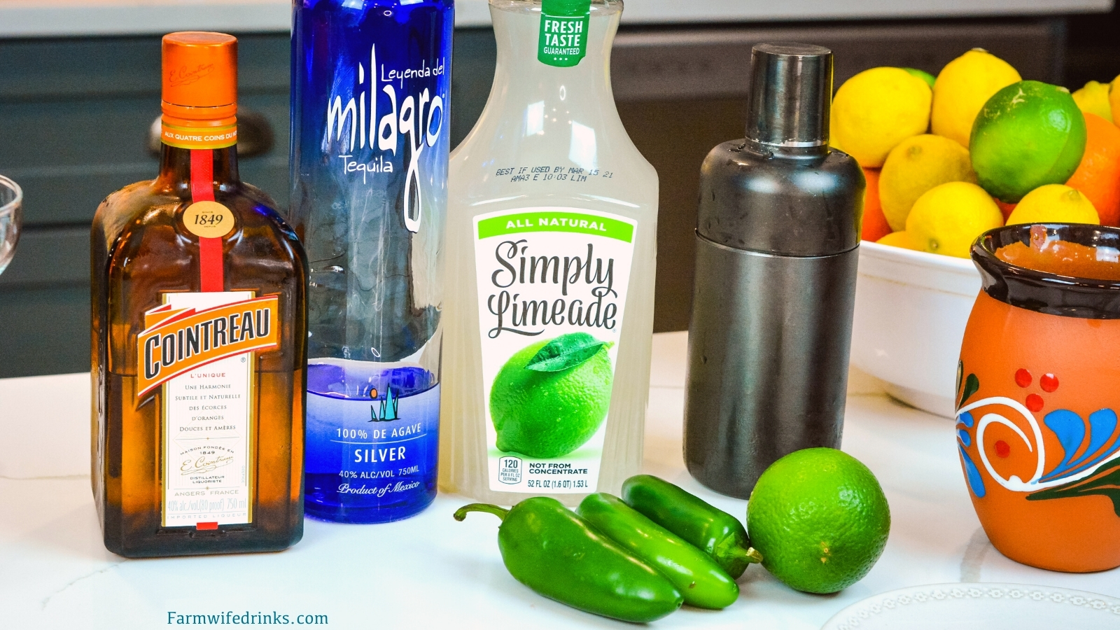 This spicy margarita does just that by combining a limeade, tequila, Cointreau with a bit of jalapeno for fresh jalapeno margaritas.