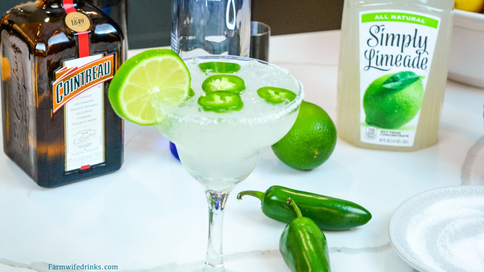 This spicy margarita does just that by combining a limeade, tequila, Cointreau with a bit of jalapeno for fresh jalapeno margaritas.
