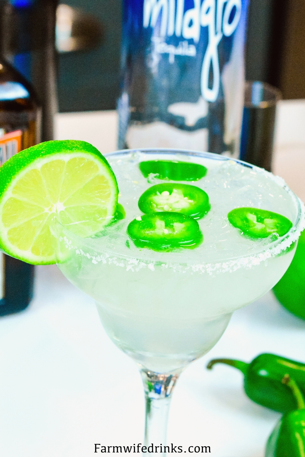 This spicy margarita does just that by combining a limeade, tequila, Cointreau with a bit of jalapeno for fresh jalapeno margaritas.