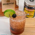 This fruity cocktail is a cherry amaretto limeade cocktail made easily with the combination of amaretto, limeade, and maraschino cherries.