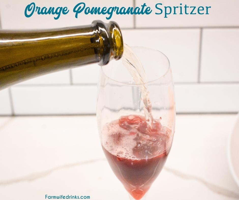 This orange pomegranate champagne spritzer is just that easy fancy champagne cocktail you need to know how to make for celebrations.