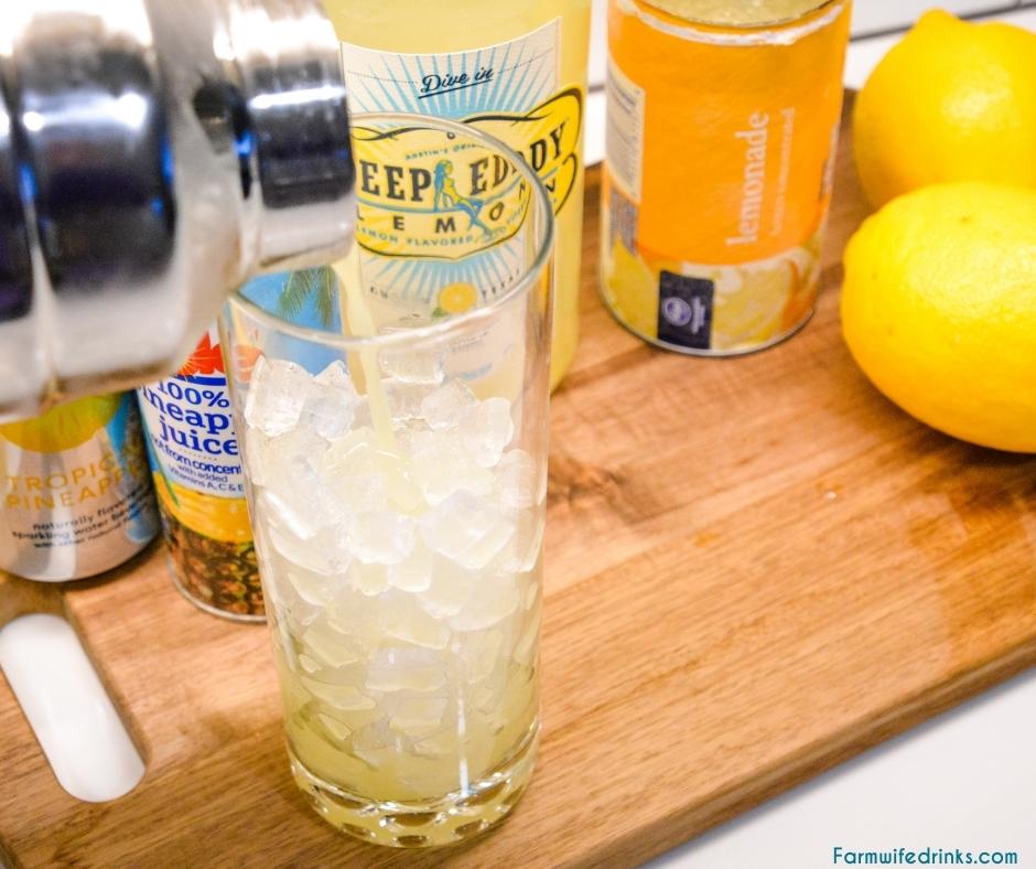 Pineapple Lemonade Vodka Cocktail is a sweet spiked punch made with pineapple juice, lemonade concentrate, lemon vodka, and sparkling water.