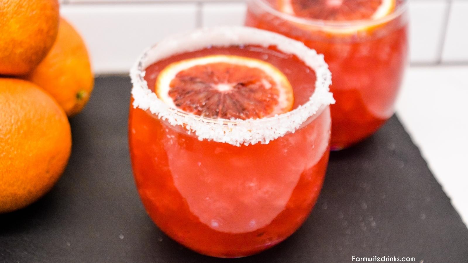 This simple blood orange margarita is made with fresh blood oranges and limes, simple syrup, tequila, and Cointreau for a quick and delicious margarita.