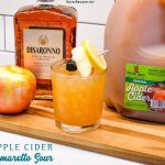 Apple Cider Amaretto Sour drink is the perfect fall cocktail that is sweet and crisp, greatfor sitting around a campfire sipping on a drink. The recipe is simple with just lemon juice, apple cider, and amaretto shaken together for drink that won't get you drunk too fast.