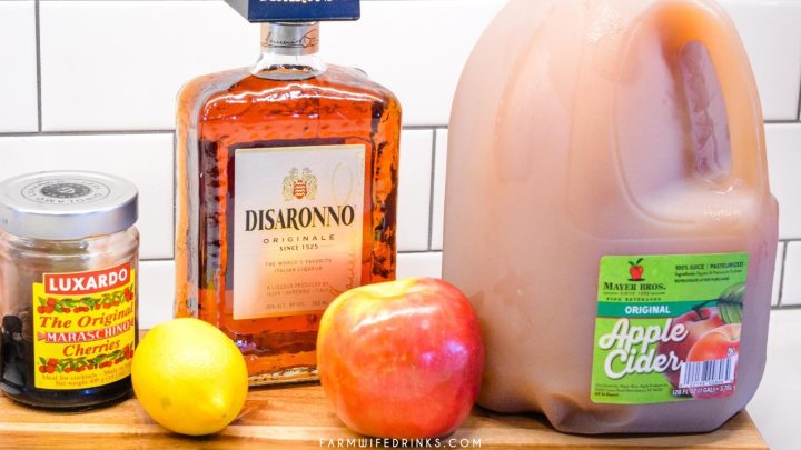 Apple Cider Amaretto Sour drink is the perfect fall cocktail that is sweet and crisp, great for sipping around a campfire. The recipe is simple with just lemon juice, apple cider, and amaretto.