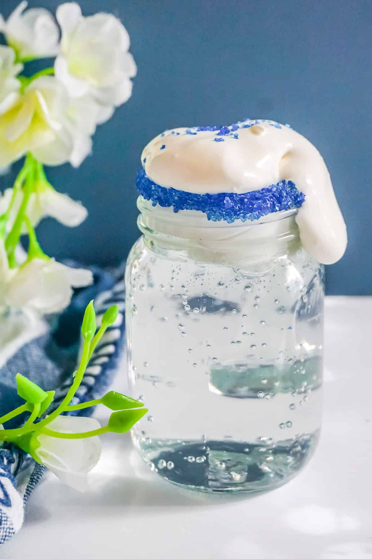 Whipped Cream over flowing on the Blueberry Pie Shot.