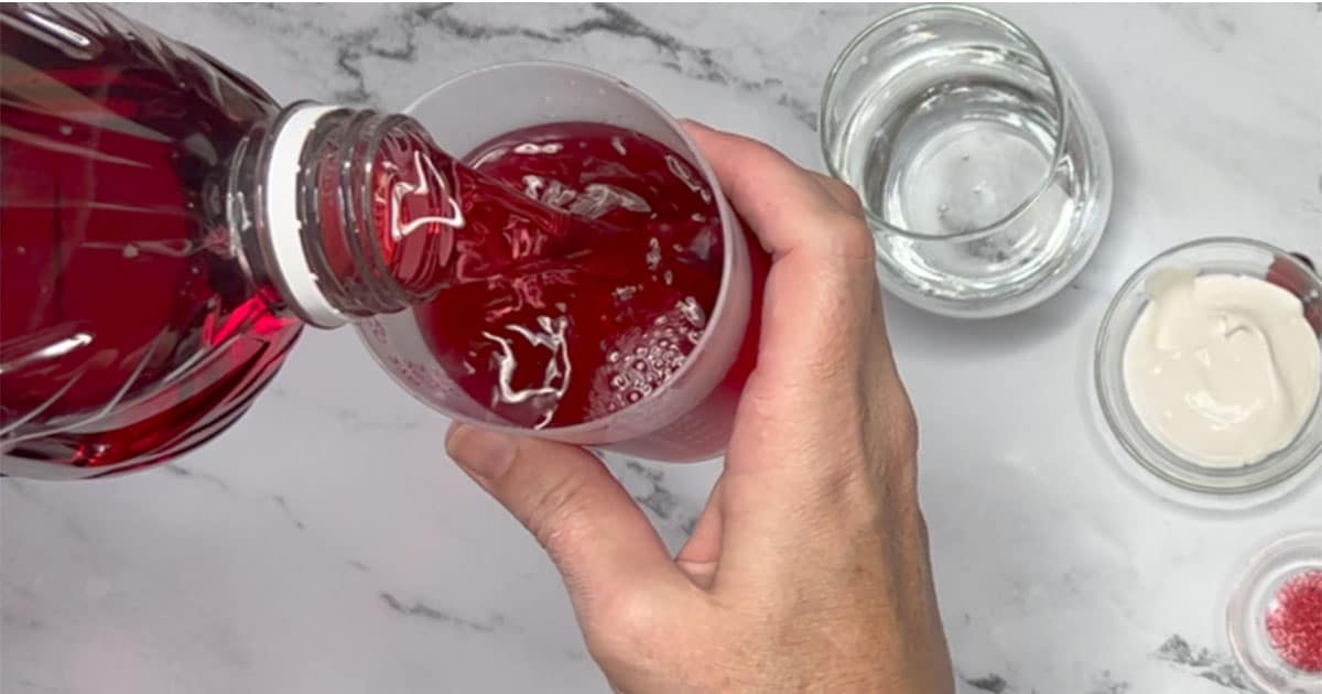 Measure out Cranberry cocktail Juice.