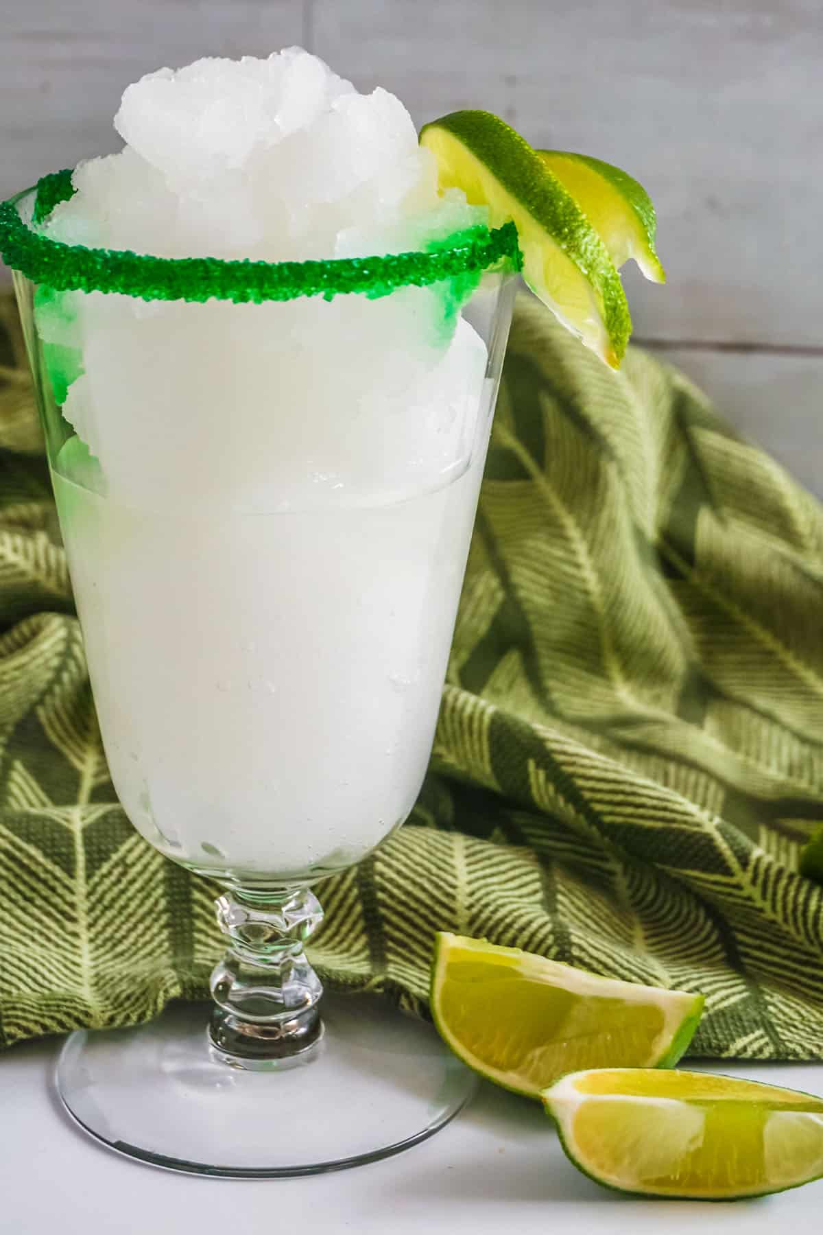 Frozen Limeade with sugared rim and Lime wedges.