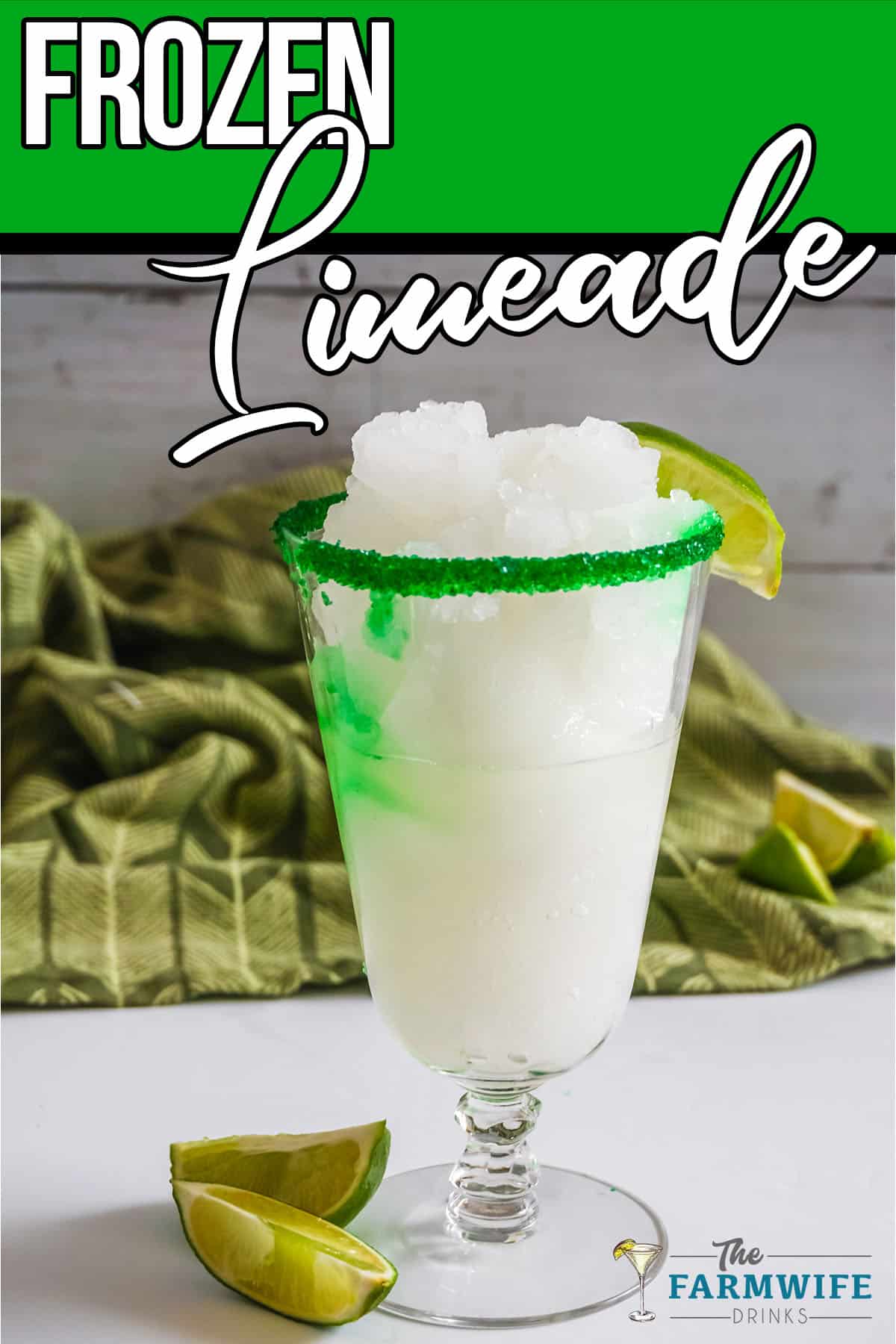 Green Frozen Limeade with sliced Limes on rim.