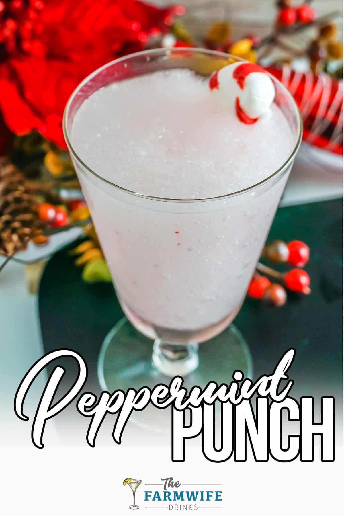 Frozen Peppermint Punch with Peppermint candy on top of drink.