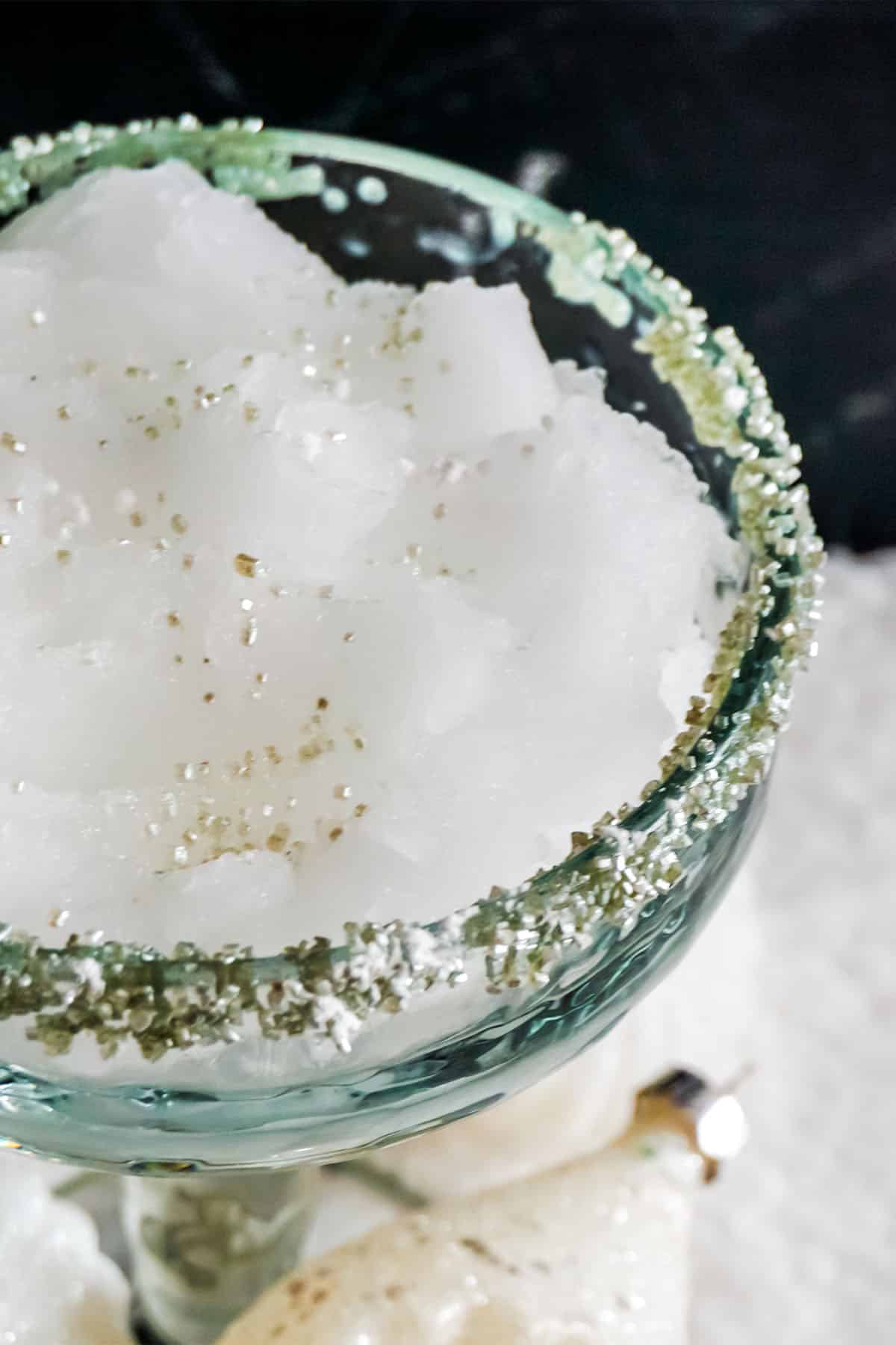 Close up of Powder sugar on top of Snowball Margarita.