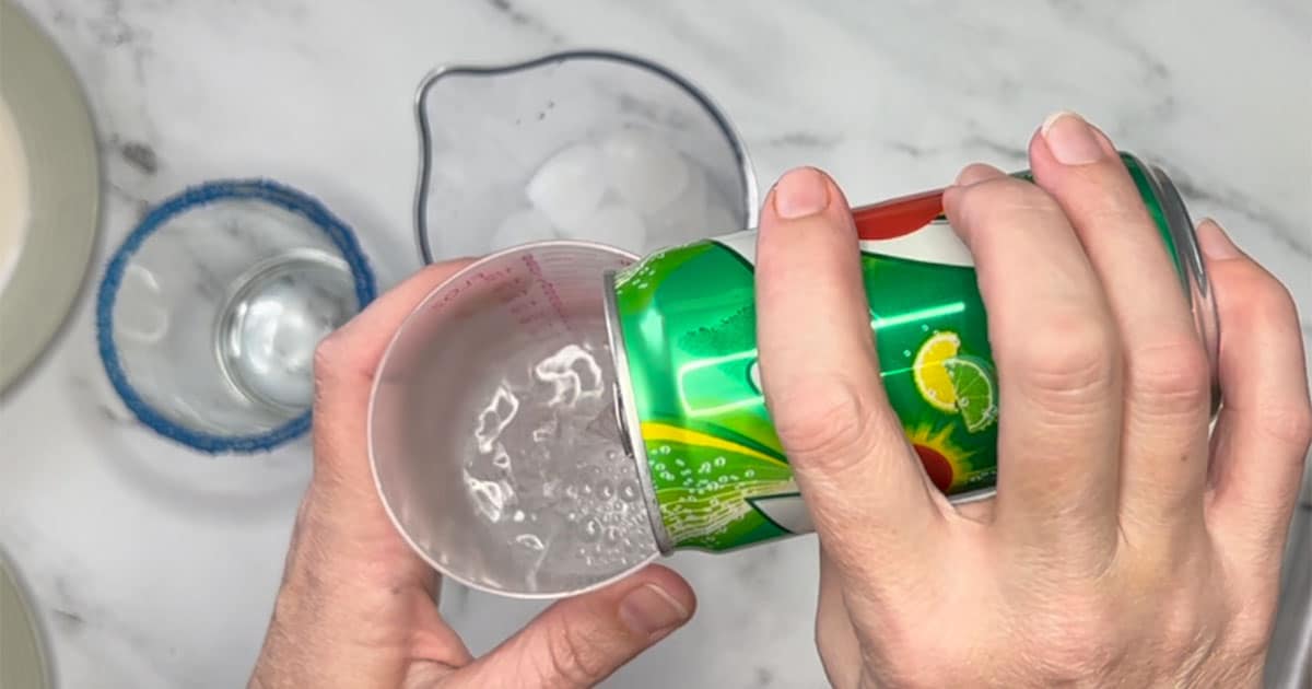 Measuring out 7up for Snowball Punch.