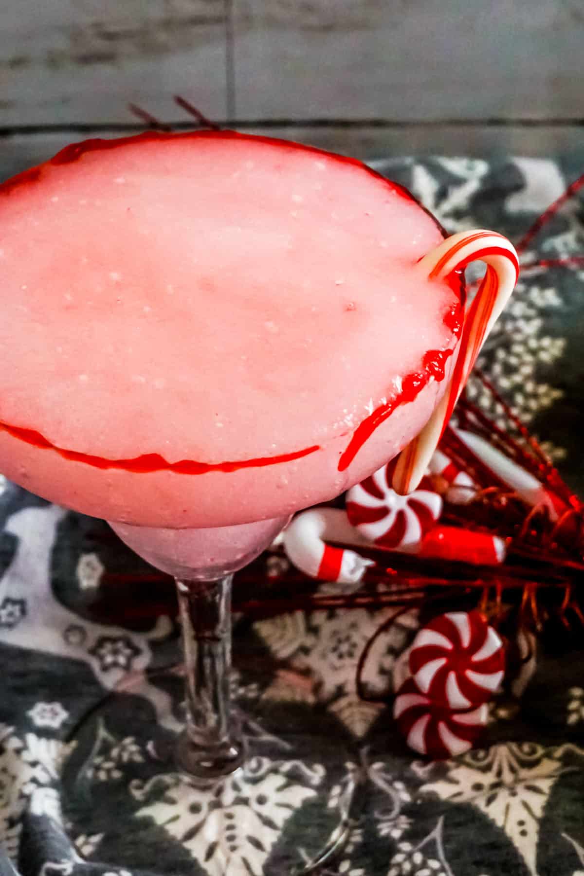 Candy Cane dangles on the side of the Candy Cane Margarita.