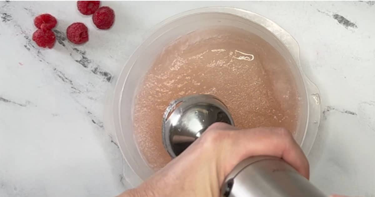 Using immersion blender on frozen wine for the Wine slushy.