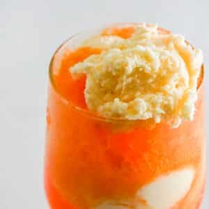 Close up of vanilla ice cream on Creamsicle Mimosa Float.