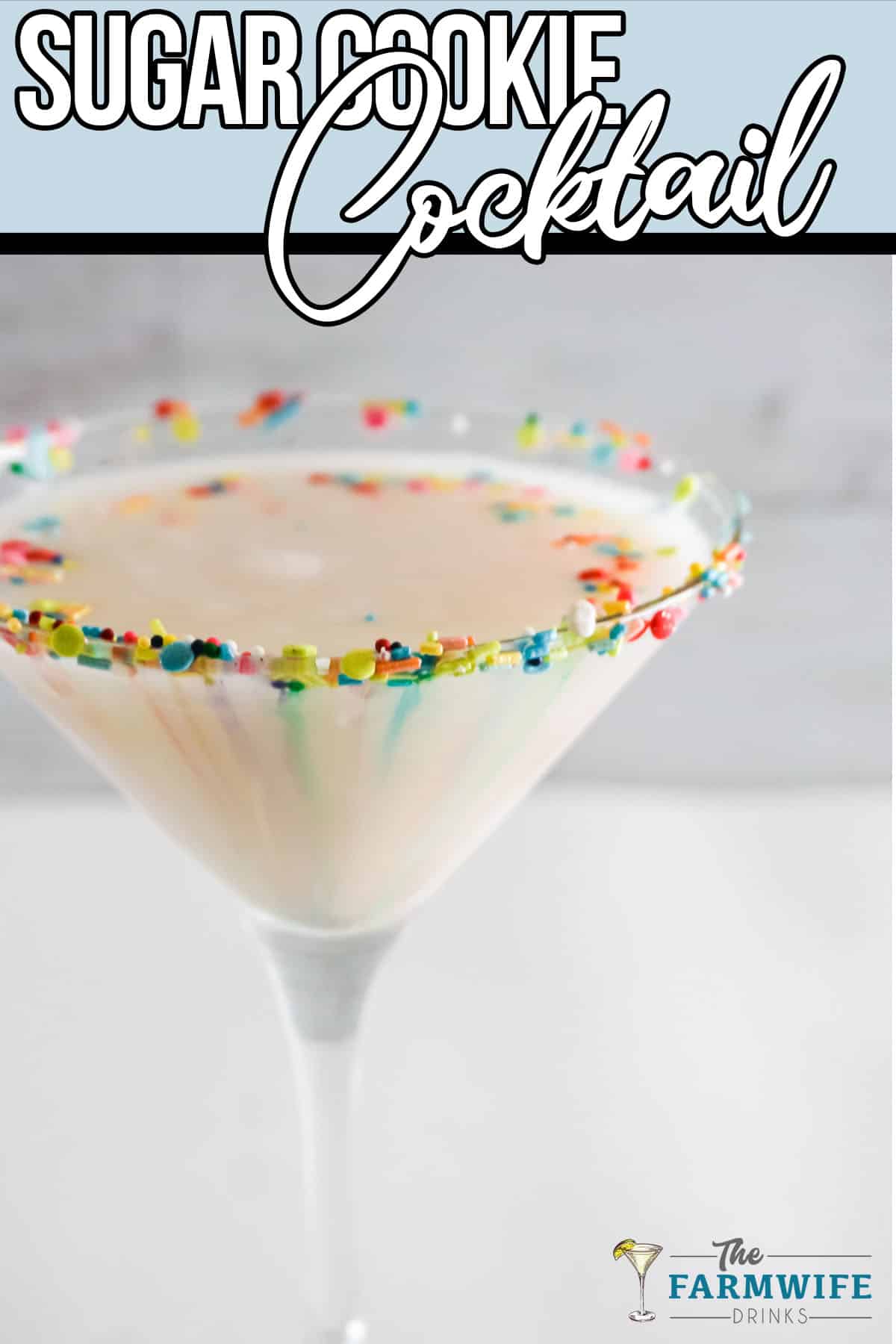 Sugar Cookie Cocktail, rainbow of sprinkles showing through cocktail.