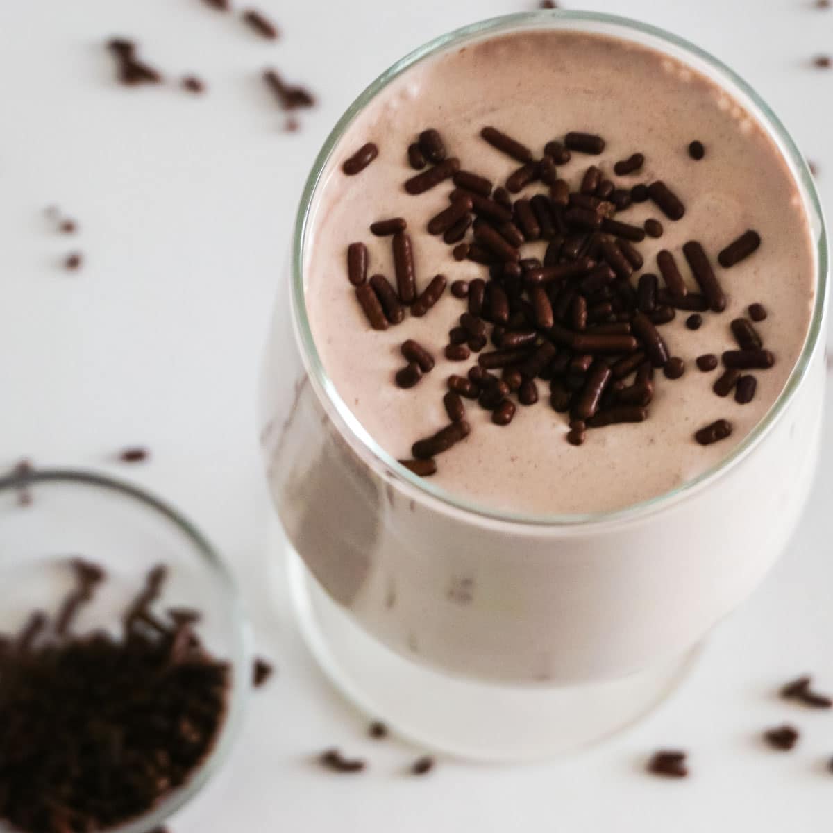 Top view of Whipped Hot Cocoa with Chocolate sprinkles on top and in bowl.