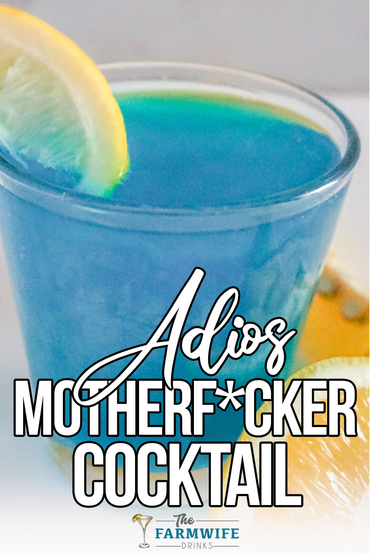 closeup of blue cocktail with text which reads Adios Motherfucker cocktail