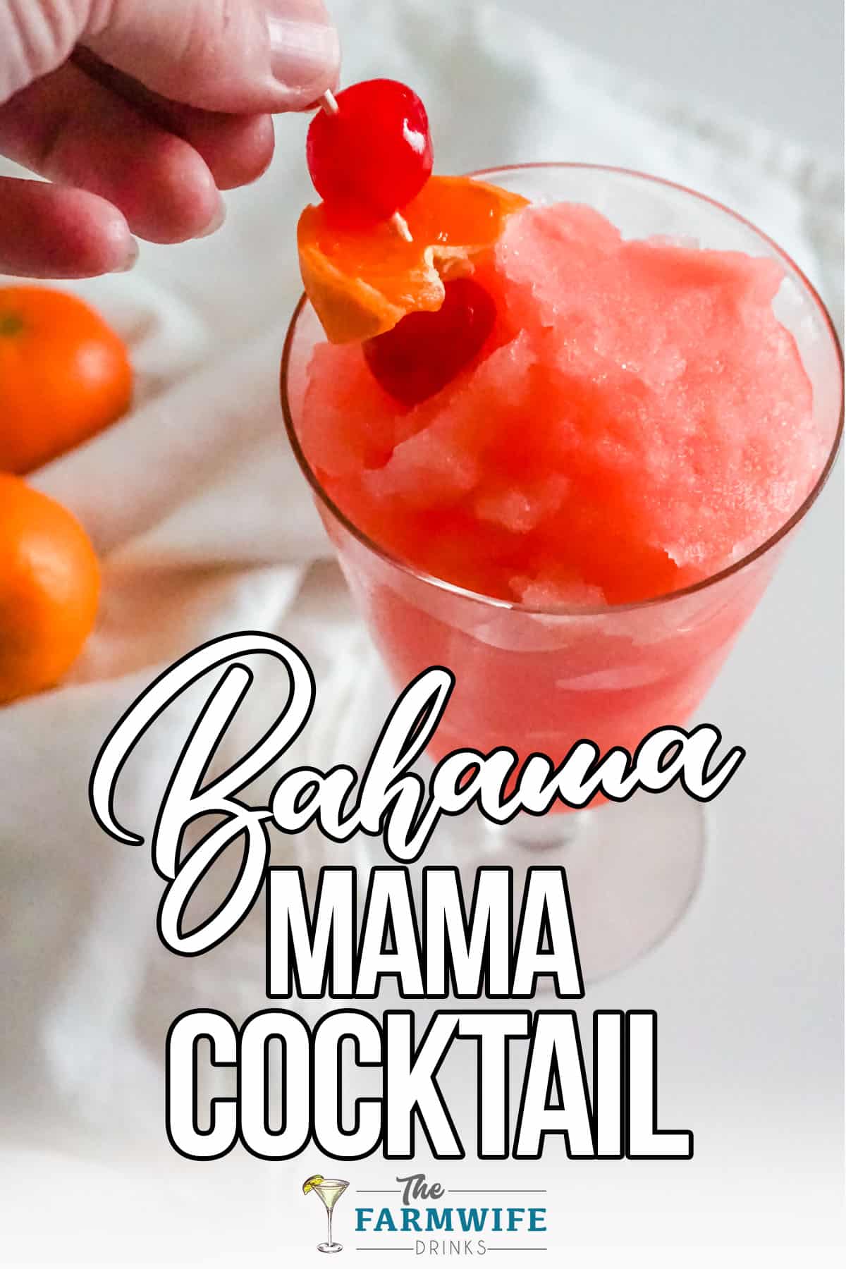 cocktail being garnished with text which reads bahama mama cocktail