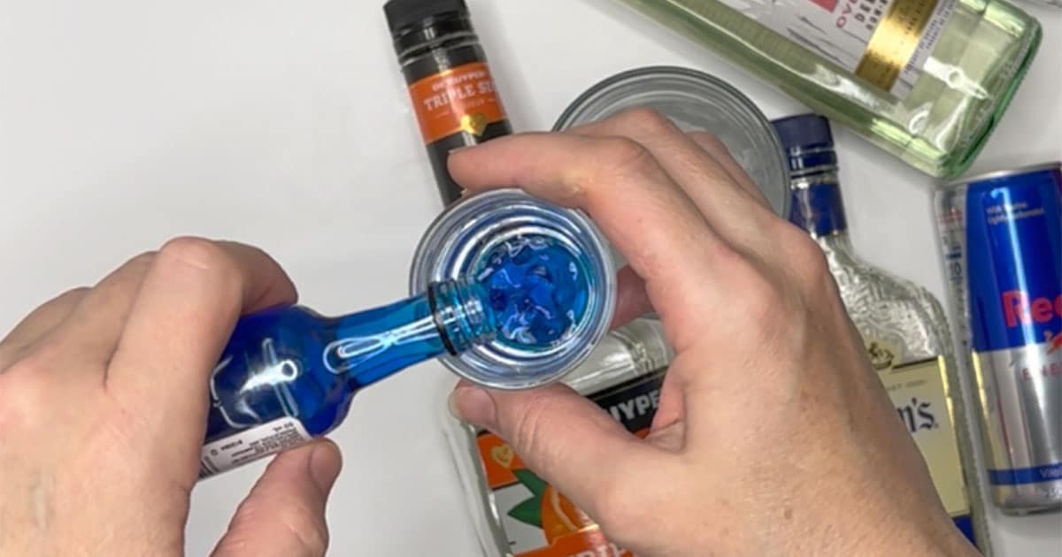 ingredients being measured to make a irish trash can cocktail