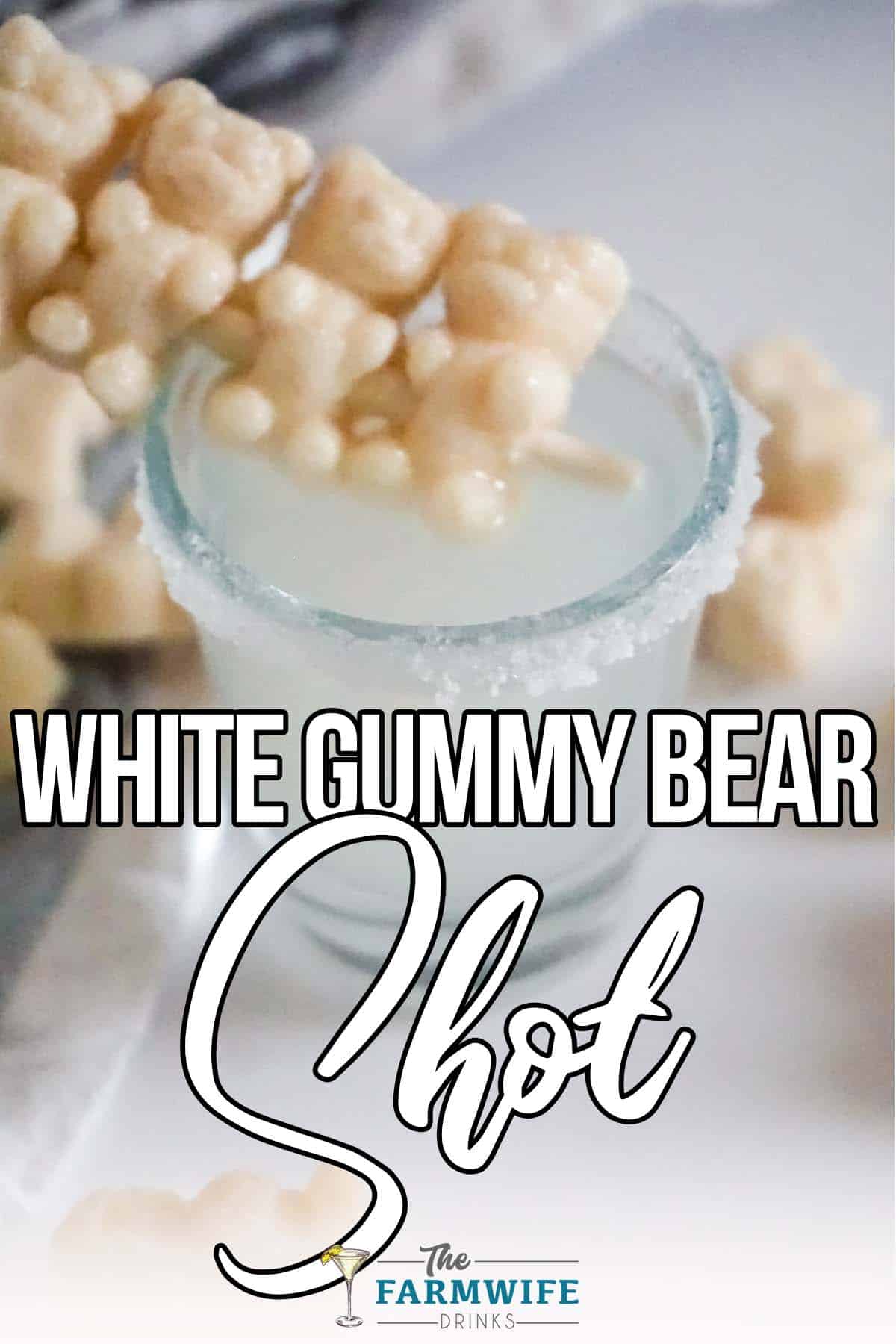 closeup of a shot glass of the white gummy bear drink with text which reads white gummy bear shot