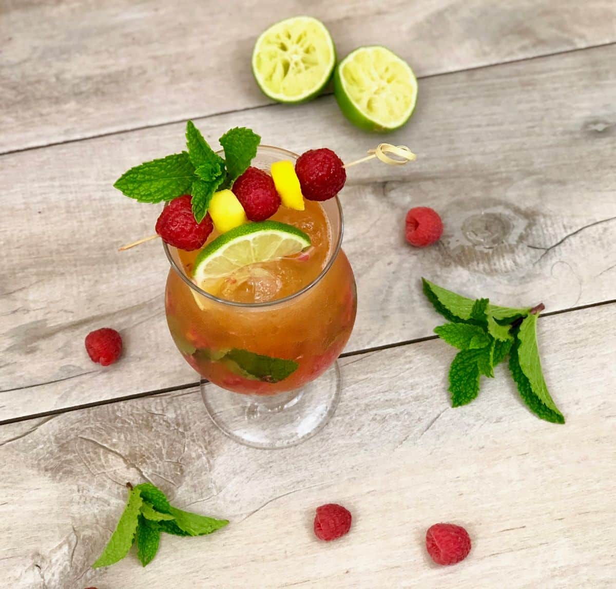 Passion Fruit, Mango, and Raspberry Mojito Mocktail