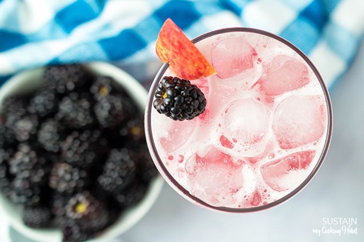 Peach and blackberry vodka cocktail