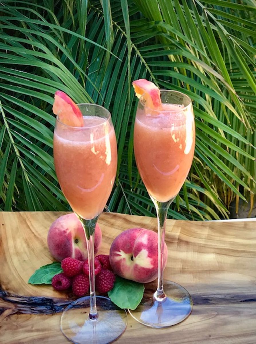 Bellini Cocktail with Fresh Peach Puree - The Art of Food and Wine